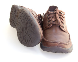 brown leather shoes isolated over white