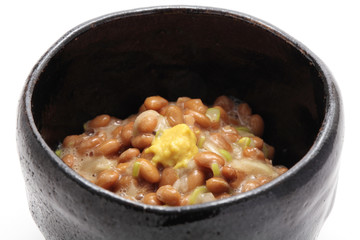 Natto, fermented soybeans on white background