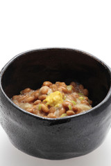 Natto, fermented soybeans on white background