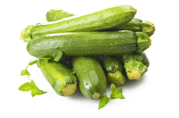 Fresh zucchini close up on the white