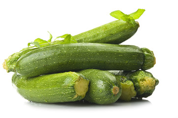Fresh zucchini close up on the white