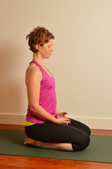 Fototapeta premium Woman Doing Yoga Indoors