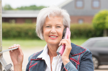 Senior woman at phone
