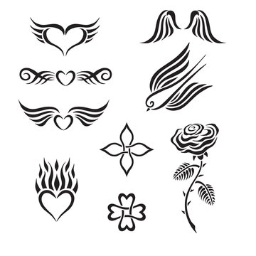 Set of tribal tattoo including hearts, rose, swallow, wings