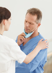 Doctors failure. Young female doctor comforting her depressed co