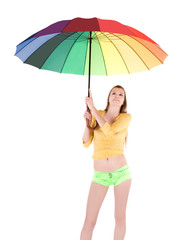 Woman with spectrum umbrella over white