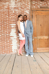 Vintage fashion romantic wedding couple in old urban building. M