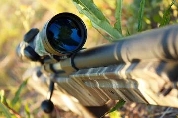 Foto op Canvas Bolt action sniper rifle met telescopische zicht close-up © arska n