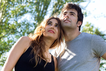 outdoor portrait of young couple at the park
