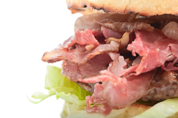 Hamburger with bacon close-up isolated on white background