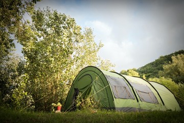 green tent in the wild © minzpeter
