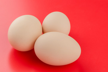Three brown eggs
