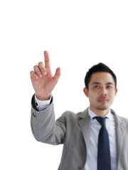 Business man pushing on a touch screen interface