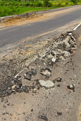 Asphalt pavement on both sides of the street was demolished