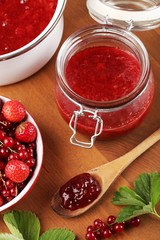 Strawberry jam and berry fruits