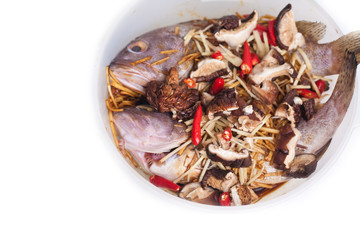 Steamed grouper with spicy isolated on white