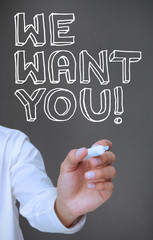 Businessman writing we want you