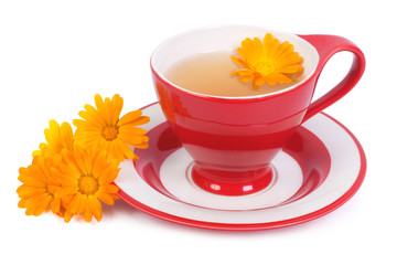helpful tea with marigold flowers isolated on white background
