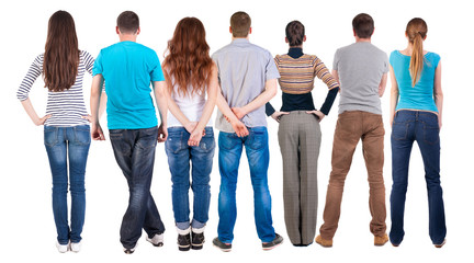 Fototapeta premium Back view group of people looking