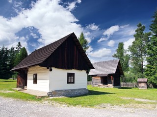 Fototapeta na wymiar Rare wooden folk houses in Pribylina