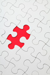 Obraz premium Missing puzzle piece in red color