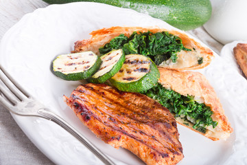 grilled steaks with puff pastry bag and zucchini