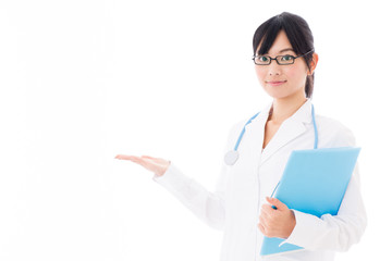attractive asian doctor showing on white background