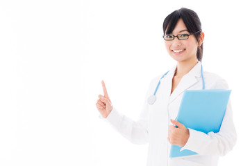 attractive asian doctor showing on white background