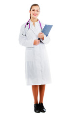Fototapeta premium Smiling young doctor in white coat standing