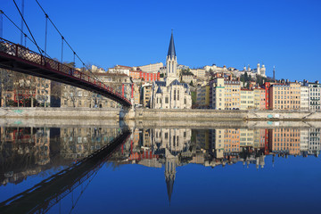 Famous view of Saone river and footbridge in Lyon city