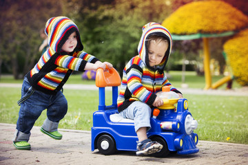 Little boys playing in the park.