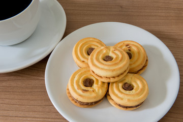 Closeup of cookies and a cup of coffee