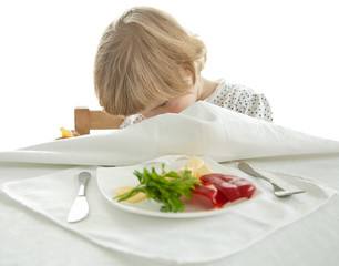 Obraz na płótnie Canvas Healthy eating for a playful little girl