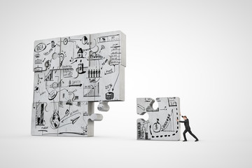 man building puzzle with business strategy