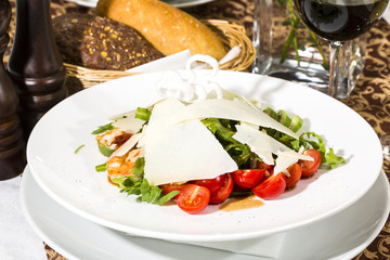 arugula dish with shrimp in a restaurant
