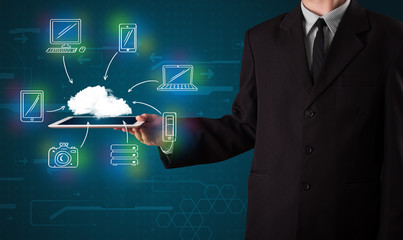 Businessman showing hand drawn cloud computing