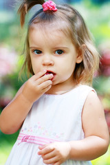 girl eating plum