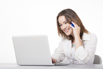 A beautiful young business woman at work