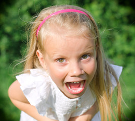 Little girl screaming at the camera © M-Production