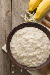 bowl of oatmeal on wood