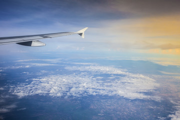 View from airplane on top of cloud