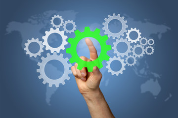 Hand touching Display cogwheels