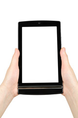 Hands holding touch screen tablet pc with blank screen