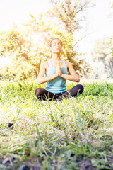 Beautiful young woman doing yoga