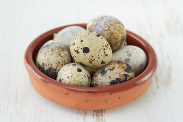 quail eggs in ceramic dish