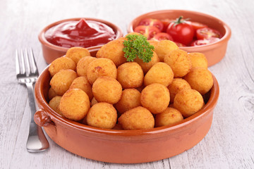 potato ball and ketchup