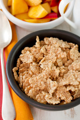 cereals in bowl and nectarine