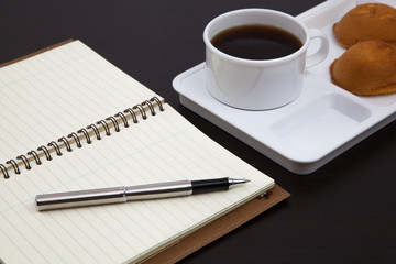 Cup of coffee and book