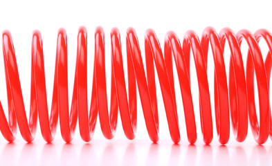 Plastic spring isolated on a white background