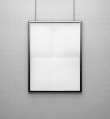 blank frame on a grey wall